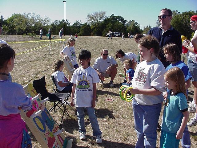 Stephanie playing ring toss.JPG